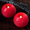 Set 2 velas redondas rojas con luz led 12 cm